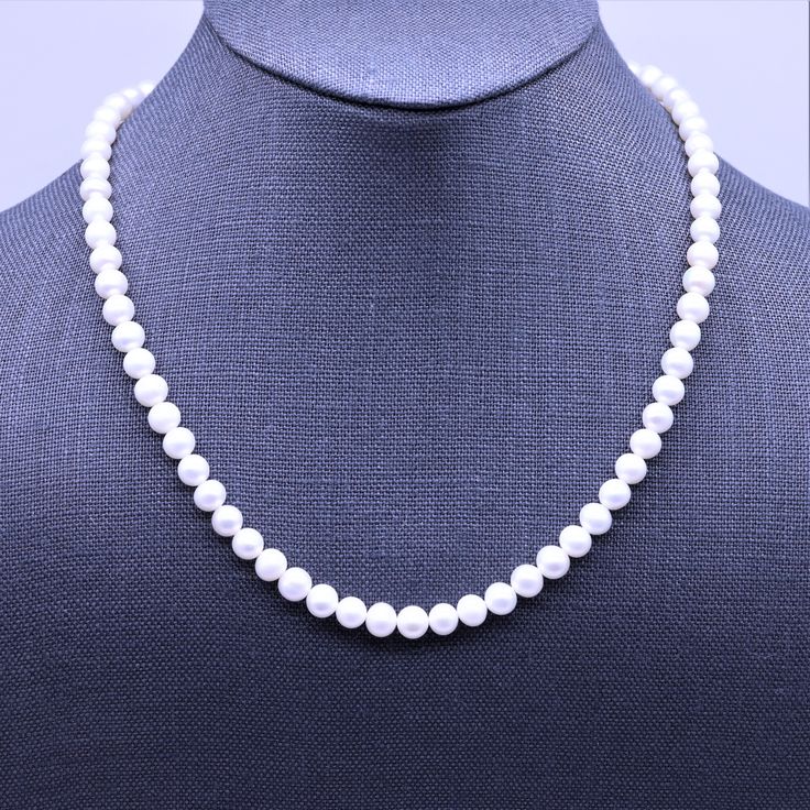 "This classic necklace is made with medium size 6mm high quality genuine AAA grade natural freshwater pearls. These natural pearl gemstones have a superior polish, are perfectly calibrated, and are uniform in size. - Not dyed, treated or color enhanced. 100% natural. - Photos taken outside in natural lighting and in a light box. - No filters or color enhancements are added to the photos. The 6mm round pearl beads are strung on strong micro woven stainless steel beading wire with nylon coating. I Classic Pearl Necklace With Polished Beads, Formal Polished Pearl Necklace, Classic Pearl Necklaces With Polished Beads, Classic Polished Pearl Necklace For Wedding, Classic Wedding Pearl Necklace With Polished Beads, Classic Round Hypoallergenic Necklace, White Polished Pearl Necklace For Formal Occasions, Classic Pearl Necklace With Round Beads And Pearl Drop, Classic Pearl Necklace With Round Pearl Drop