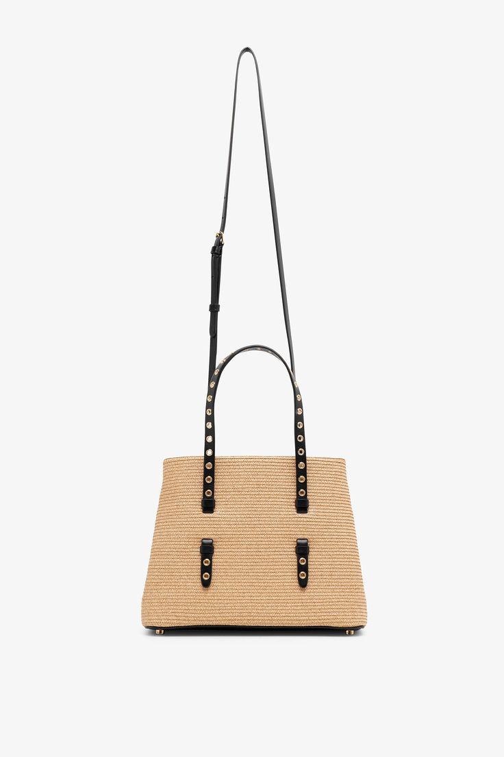 Beige and black raffia tote bag from Alaia. The Mina tote bag has two top-handles, an optional crossbody strap, along with a detachable zipped pouch inside.Measurements: L25 x H19.5 x W12.5 cmPlease note the Mina bag no longer includes a small mirror insideMade in Italy Natural Bucket Bag With Leather Handles For On-the-go, Versatile Straw Satchel Bag With Adjustable Strap, Summer Crossbody Bucket Bag For On-the-go, Summer Bags With Adjustable Strap For On-the-go, On-the-go Natural Bag With Detachable Strap, Summer Rectangular Hobo Bag With Detachable Handle, Versatile Beige Straw Bag With Double Handle, Beige Tote Satchel With Top Carry Handle, Natural Satchel With Adjustable Strap