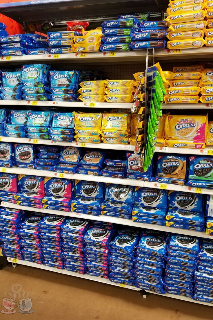 a store shelf filled with lots of different types of snacks