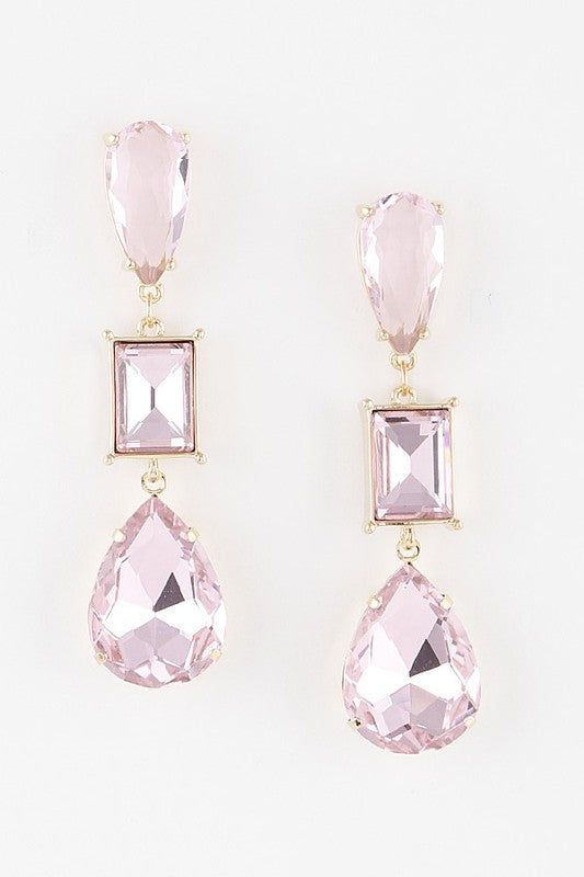 These are the perfect earrings to pair with your formal gown to complete your look. Crystal Drop Earrings 0.8 x 2.8" Approx. Lead & Nickel Exchanges We have a 7-day exchange policy, which means you have 7 days after receiving your item to request an exchange. We only do exchanges or instore credit. We do not offer refunds!To be eligible for an exchange, your item must be in the same condition that you received it, unworn or unused, with tags, and in its original packaging. Free of make-up, deodo