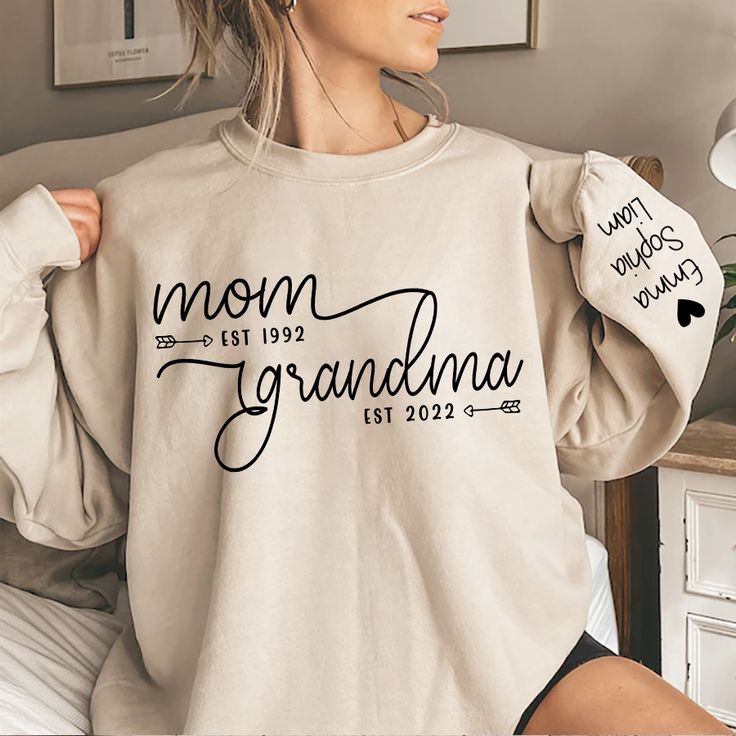 Personalized Mom Grandma Sweatshirt, Custom Mom Grandma Est With Kids, Mom Gift Grandma Gift TH Sweatshirt Suitable for many occasions such as Christmas, Father's Day, Mother's Day, birthday This classic crew-neck sweatshirt is an essential basic item for anyone’s wardrobe. The ribbed cuffs on the sleeves and waist are reinforced, and the high-quality cotton ensure that anyone will enjoy this cuddly and cool sweatshirt for many moons to come. Preshrunk fleece knit Double-needle stitching at shou Grandma Sweatshirt, Idee Cricut, Grandma Sweater, Cute Shirt Designs, Grandma Shirts, Grandma Gift, Mom And Grandma, Custom Sweatshirts, Mom Kid