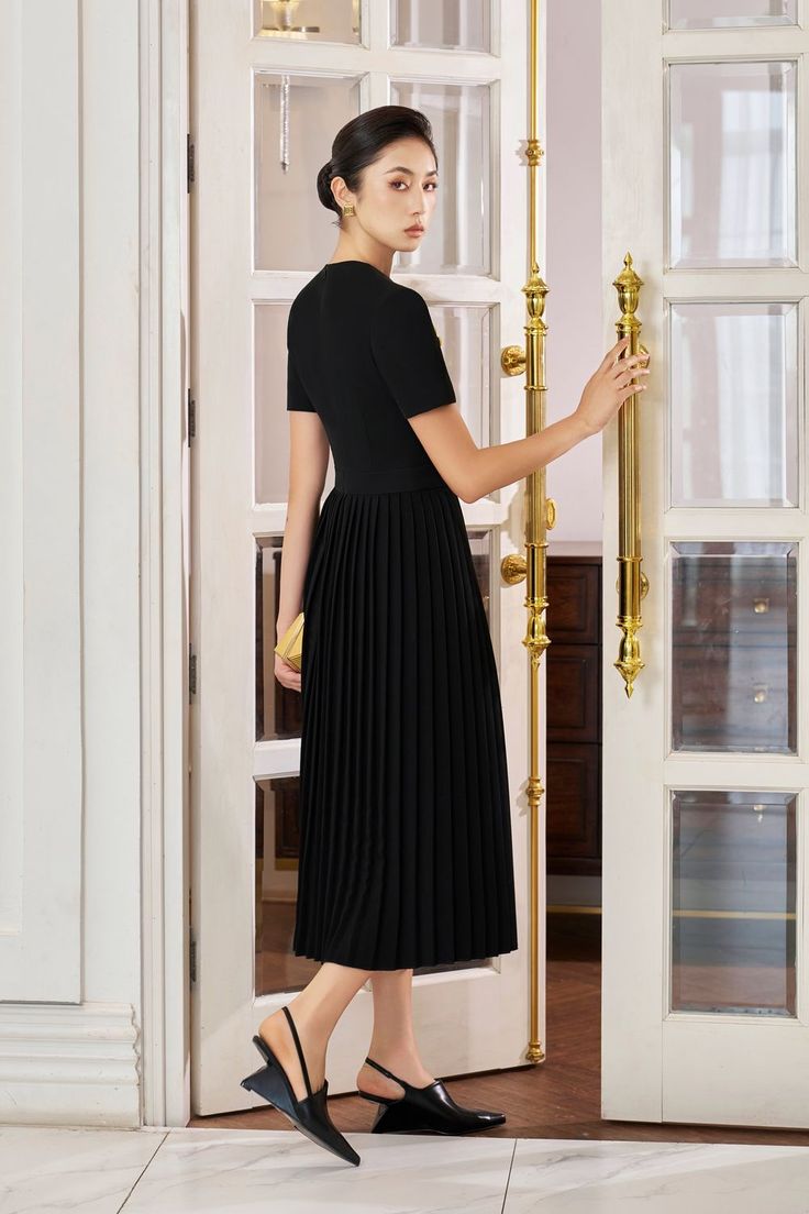 With its unique pleated asymmetric neck design, this dress oozes elegance and sophistication. Made of high-quality gabardine fabric, this dress offers a timeless style and comfortable fit. Perfect for any occasion, this dress is a must-have for any fashion-forward individual. *Note: The length is measured from the shoulder to the shortest of the front. Office Attire, Neck Designs, Designer Collection, Pleated Skirt, Sleeve Styles, Latest Fashion Trends, Timeless Fashion, Fashion Forward, Designer Dresses