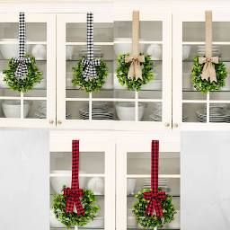 wreaths are hung on the back of china cabinets with red and black plaid bows