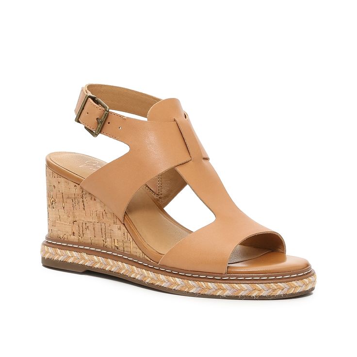 Crown Vintage-Kaamil Wedge Sandal Elevate summer fits with the Kaamil wedge sandal from Crown Vintage. Perfect to pair with a breezy skirt or a colorful sundress, this pair sports a cork wedge with espadrille detailing to lend beachy style to a fit. Brown Synthetic Wedge Sandals For Summer, Open Toe Cork Wedge Sandals For Beach, Cork Open Toe Wedge Sandals For Beach, Leather Wedge Sandals For Spring Beach Occasion, Summer Sandals With Cork-bed Midsoles In Natural Color, Cork Wedge Heel Sandals For Vacation, Cork Wedge Sandals For Vacation, Leather Wedge Sandals For Summer Vacation, Brown Wedge Heel Sandals For Summer