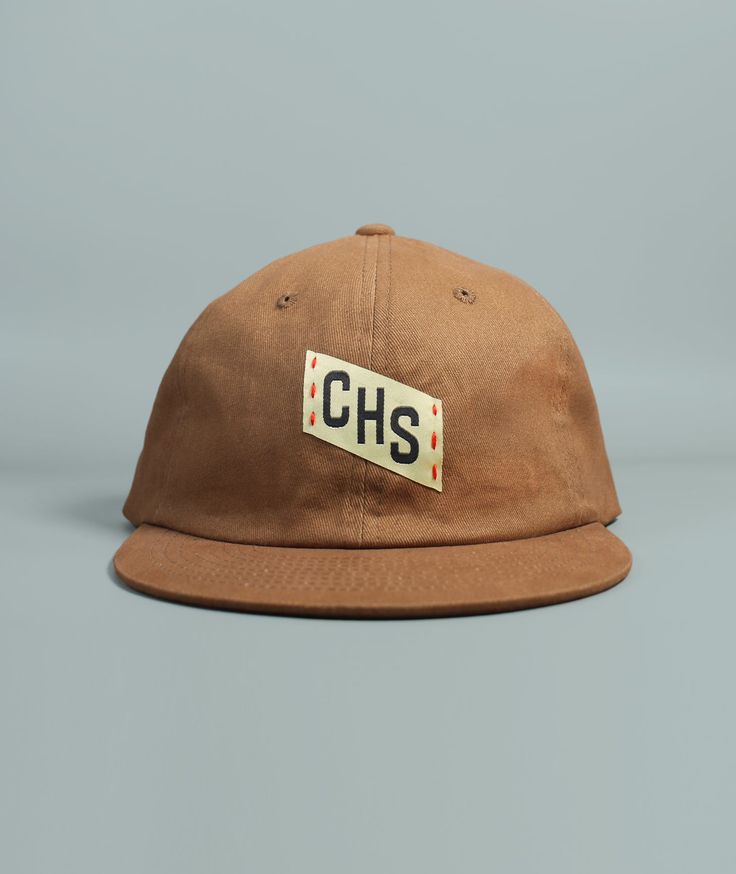 Our CHS Embroidered Charleston hat features hand embroidered and woven patch details, a perfectly worn in feel, front and back woven patch details, and adjustable brass buckle clasp.Made from washed 100% cotton twill fabricFabric strap with adjustable brass buckle claspDue to the handmade nature of this design items may have slight variations Pre-washed Cotton 5-panel Hat, Vintage Cotton Adjustable Baseball Cap, Vintage Pre-washed Dad Cap, Vintage Pre-washed Dad Hat, Vintage Adjustable Canvas Baseball Cap, Vintage Dad Hat For Everyday, Vintage Cotton Baseball Cap For Outdoor, Vintage Cotton Dad Hat One Size, Adjustable Canvas Hat With Logo Patch