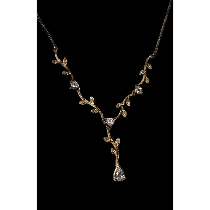 Whimsical fantasy vintage floral bridal necklace. It's on a stylized chain with faceted antiqued gold balls that give a slight shimmer. The chain is marked LD on one side, and says "Silver" with some numbers that I can't make out on the other. The clasp is also marked 925. It has an intricate weaving for florals and leaves in gold tone metal with cubic zirconia accents. Lovely fantasy princess wedding vibes! Features: * Gold tone chain. * Gold florals and leaves. * Sparking cubic zirconia. * Cha Elegant Brass Wedding Necklaces, Elegant Brass Necklaces For Wedding, Elegant Formal Necklace In Antique Gold, Elegant Antique Gold Necklace For Formal Occasions, Elegant Antique Gold Brass Necklaces, Elegant Antique Gold Necklaces For Anniversary, Dainty Brass Necklaces For Formal Occasions, Wedding Brass Costume Jewelry Necklaces, Elegant Antique Gold Necklaces For Party