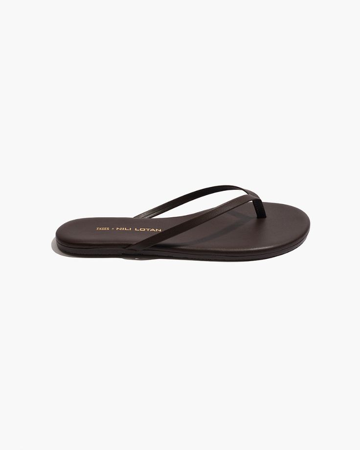 Slip on sandal in matte napa luxury calfskin leather. Made in Brazil. Classic Leather Flip Flops For Spring, Classic Leather Flip Flops With Cushioned Footbed, Modern Leather Flip Flops With Leather Footbed, Sleek Calf Leather Sandals With Leather Sole, Classic Leather Flip Flops With Leather Footbed, Classic Brown Leather Flip Flops, Classic Flat Leather Sandals, Sleek Open Toe Calf Leather Sandals, Modern Leather Flip Flops With Textured Footbed