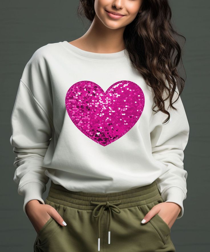 Faux Sequins Valentines Shirt - Glitter Heart Shirt Womens Valentines Top ValentinesTee - Bling Valentines Shirt-Sequins Heart Sweatshirt } Handmade } Ships from Texas! Shorter shipping distances are  kinder to the planet - This design will be made with DTF. - If you want to add or change anything on the existing design that we show in the display picture, please contact with the seller from message box to ask if the changes and additional request can be done or not, if you do not ask and request for it without asking in the order we will ship the item as it is without the requests done. * Our unisex cozy sweatshirts & tees are soft and durable! * Ships within 1 business day! * Shop with Confidence! We are a 5-Star Rated Shop! * Easy measuring tip: Take your favorite sweatshirt or tee, lay Pink Sequined Crew Neck T-shirt, Pink Sequined Crew Neck Top, Casual Pink Sequined T-shirt, Heart Sweatshirt, Display Picture, Fun Sweatshirts, Glitter Hearts, Message Box, Heart Shirt