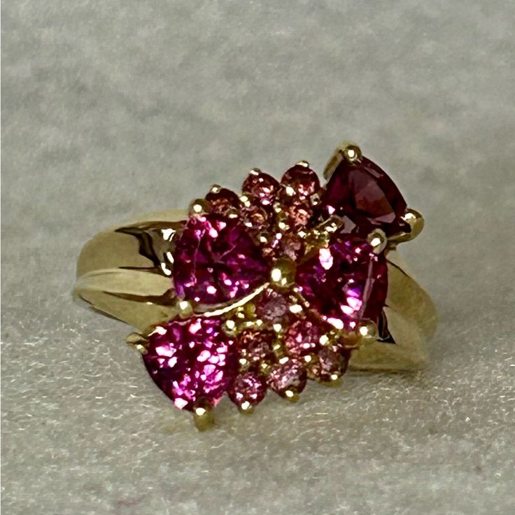 Multi Stones Of Pink Topaz In 10k Gold Ring. Size 7. Never Worn. Pink Multi-stone Sapphire Ring, Pink Multi-stone Sapphire Ring, Fine Jewelry, Pink Multi-stone Sapphire Ring In Fine Jewelry Style, Luxury Pink Multi-stone Ruby Ring, Pink Sapphire Ring With Gemstone Accents, Fine Jewelry Pink Cluster Ring With Accent Stones, Elegant Pink Multi-stone Sapphire Ring, Pink Cluster Ring For Formal Occasions, Luxury Pink Cluster Jewelry