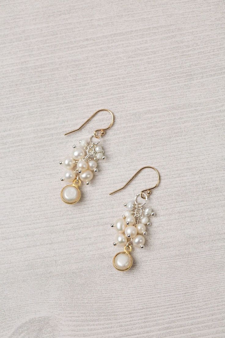 Experience the beauty and craftsmanship of the Seaside Collection with these gorgeous handmade earrings.    Mixed Metal (lead and nickel free) Pearl 1.5", with gold filled ear wires We hand select our natural materials, thus there may be slight variations in color and/or size that will not detract from the overall aesthetic Our unique handcrafted designer jewelry for women is made in America, with each design created individually in our personal design studio in Floyd VA USA Handmade Dangle Pearl Earrings In 14k Gold Filled, Handmade 14k Gold-filled Dangle Pearl Earrings, Handmade 14k Gold Filled Dangle Pearl Earrings, Wire Wrapped 14k Gold Filled Earrings For Wedding, 14k Gold Filled Wire Wrapped Earrings For Wedding, 14k Gold Filled Wire Wrapped Wedding Earrings, Wedding 14k Gold Filled Wire Wrapped Earrings, Handmade 14k Gold-filled Chandelier Drop Earrings, Handmade 14k Gold Filled Pearl Earrings For Anniversary