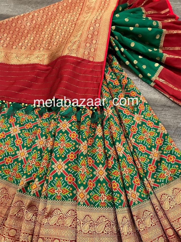 *Fine Silk Patola Saree! *Glamorous saree in green with patola weaving all throughout and Banarsi border *Matching blouse fabric included *Fall attached and designer tassels on the palla Note: The color of the products may slightly vary according to the ambient lighting conditions and the color calibration of LED devices. If you would like more clarity before your purchase, please drop us a message . Festive Green Pre-draped Saree With Zari Weaving, Green Pre-draped Saree With Zari Weaving For Diwali, Green Paithani Silk Pre-draped Saree With Self Design, Green Pre-draped Saree With Self Design For Diwali, Transitional Green Pre-draped Saree With Self Design, Green Unstitched Traditional Wear With Zari Work, Green Choli With Pallu For Navratri, Green Semi-stitched Saree, Green Traditional Wear For Navratri With Traditional Drape