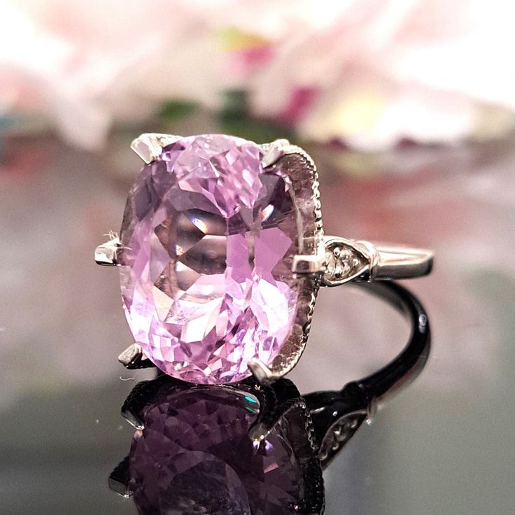 10.50 Carat Natural Kunzite & Diamonds 14k Solid Gold Ring  Ring Material: 14k Solid Gold  Total Metal Weight: 4.9 Grams  Gemstone: Natural Kunzite Gemstone Color: Delicate Light Pink Gemstone Shape: Oval Gemstone Dimensions:  15.00x11.00 mm Gemstone Carat Weight: 10.40 Carat Gemstone Quantity: 1 Diamonds: Natural Round Shaped  Diamonds Quantity: 4 Diamonds Total Carat Weight: 0.10 Carat Total Carat Weight: 10.50 Carat Ring Quantity: One  Ring Condition: New Made in the USA Delivered in an elega Oval Center Stone Gemstones For Formal Occasions, Elegant Morganite Ring For Formal Occasions, Elegant Morganite Rings For Formal Events, Exquisite Formal Morganite Ring, Formal Morganite Diamond Ring In Fine Jewelry Style, Formal Morganite Diamond Ring Fine Jewelry, Formal Morganite Diamond Ring, Oval Gemstones With Prong Setting For Formal Occasions, Classic Morganite Diamond Ring For Formal Occasions