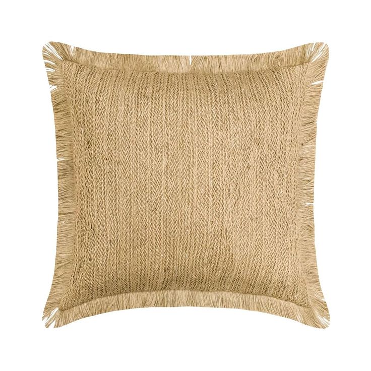 a beige pillow with fringes on the front and back of it, against a white background