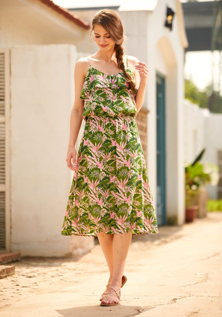 Embrace a palette of nature with the olive and pink tropical floral print midi dress from our ModCloth namesake label. With a delightful ruffle top and a stretchable cinched waist that hugs just right, this dress ensures your day is filled with comfort and vibrant flair. Perfect for brunch with friends or a casual day out exploring your favorite part of the city, its lively print and resilient fabric invite spontaneity and adventure, making every moment a little more memorable. Shell and Lining:100% Viscose Machine wash cold, line dry Imported 32.5 Model Sizing HEIGHT: 5' 7" BUST: 33 IN WAIST: 24 IN HIPS: 35 IN | ModCloth Basically Breezy Sundress in Bird Of Paradise Green Tropical Midi Dress For Beach, Green Tropical Midi Dress For Summer, Tropical Sleeveless Midi Dress For Garden Party, Tropical Green Midi Dress For Spring, Tropical Green Dress With Ruffles, Spring Tropical Print Midi Dress, Green Tropical Print Midi Dress For Garden Party, Green Tropical Print Midi Dress For Vacation, Green Tropical Print Midi Dress For Brunch