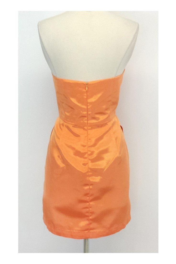 Size 8 Strapless Pleat Dress in Orange Sherbet Retails for $305.00 Body 100% Polyester Lining 100% Acetate Made in the USA Concealed back zip and clasp Pleat detail on bust and below waist On seam hip pockets Bone in bodice Across top of bust 16.5" Under bust 15.25" Bust to hem 19.25" Hips 38.5" Total length 28" Fitted Satin Dress With Back Zipper, Silk Dress With Fitted Bodice And Back Zipper, Summer Dress With Fitted Bodice And Invisible Zipper, Fitted Knee-length Strapless Dress With Lining, Formal Mini Dress With Fitted Bodice And Back Zipper, Summer Party Dress With Invisible Zipper, Fitted Silk Strapless Dress For Cocktail, Fitted Silk Strapless Dress With Sweetheart Neckline, Silk Fitted Strapless Dress With Straight Neckline