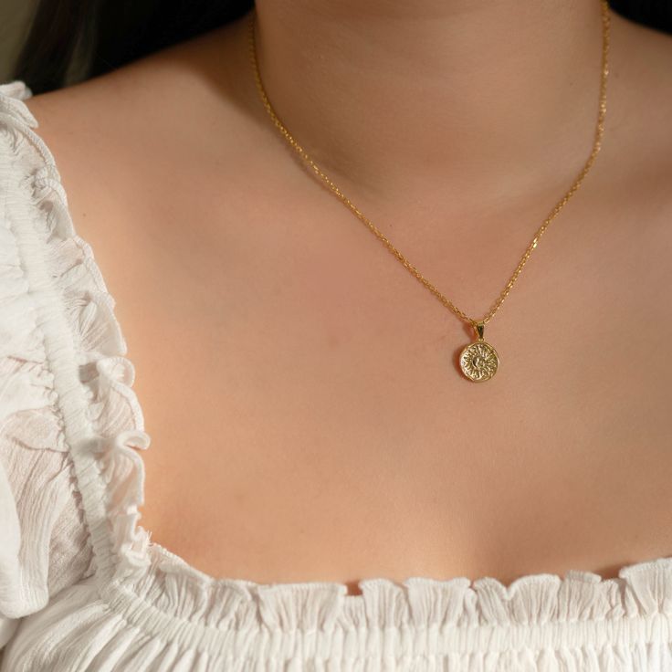 Radiate in our Sun necklace. - Waterproof, tarnish resistant & hypoallergenic- Made in gold vermeil: a thick 18k gold layer on sterling silver.- Adjustable chain 17 to 18 in.- Pendant size: 12.5 mm Sun Necklace, Star Pendant Necklace, North Star, Star Pendant, Star Charms, Gold Vermeil, 18k Gold, Size 12, Charms