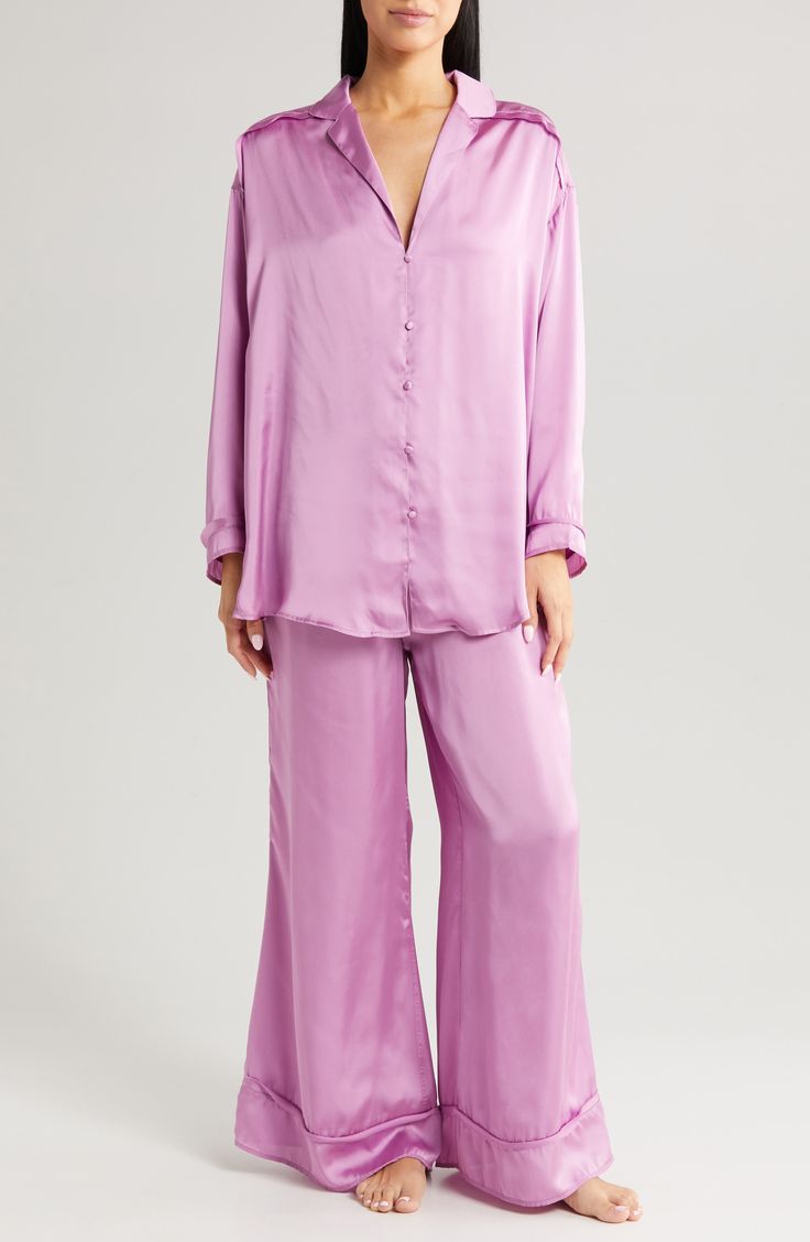 Make bedtime a bit more boho in flowy pajamas that live up to their dreamy designation by pairing a relaxed-fit top with flared bottoms. 30" top front length; 32 1/2" back length; 28 1/2" inseam; 16 1/2" leg opening; 13 1/2" front rise; 17" back rise (size Medium) Top has notched collar; long sleeves 97% polyester, 3% spandex Hand wash, line dry Imported Flowy Pajamas, Fancy Pjs, Bride Pajamas, Bride Pajama, Flared Bottoms, Silk Pajama Set, Satin Pyjama Set, Satin Pajamas, Silk Pajamas