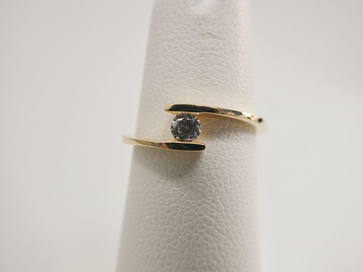 Real 14k solid yellow gold 2.5mm stone center micro fave setting tiny super high quality pinky ring size 4 / 1.5mm aaa shiny cubic zirconia stone made in 14k solid gold our 14k solid gold pieces are made in high quality to last for ever you can wear it evrey day extra high polish luxury attractive look guarantte real 14k solid gold mark and stamp perfect price come in nice gift box make great gift for any occasion Dainty Diamond Ring With Single Cut, Minimalist Vvs Clarity Jewelry For Promise Ring, Dainty Single Cut Diamond Ring, Minimalist Vvs Clarity Round Cut Ring, Fine Jewelry Cubic Zirconia Stackable Rings In Round Cut, Cubic Zirconia Stackable Rings With Single Diamond, Yellow Gold Jewelry With Single Diamond, Fine Jewelry Stackable Rings With Cubic Zirconia, Minimalist Diamond Ring With Vvs Clarity And Round Cut