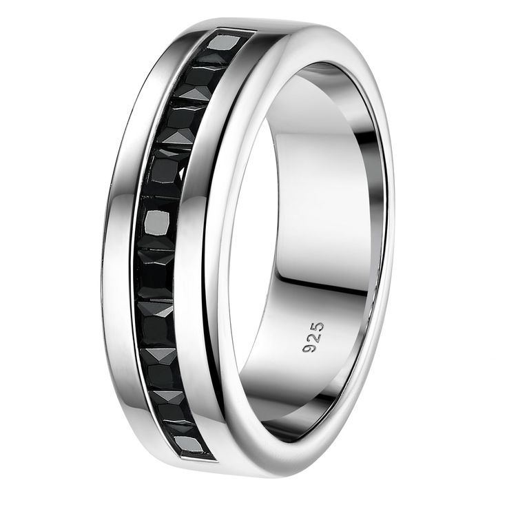 a wedding ring with black diamonds on the inside and inlays to be worn