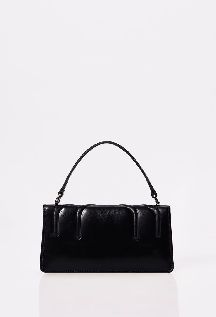 The Black Leather Crossbody Flap Bag 'Hilda' originally born in our atelier a few years ago, it now returns in a petite size yet still substantial enough to hold your small everyday essentials. Formal Baguette Bag With Adjustable Strap And Top Handle, Evening Crossbody Baguette Bag With Top Carry Handle, Evening Flap Bag With Adjustable Double Handle, Evening Flap Bag With Adjustable Strap And Double Handle, Classic Evening Bag With Adjustable Strap, Luxury Black Baguette Bag With Top Carry Handle, Formal Box Shoulder Bag With Adjustable Strap, Formal Box Bag With Adjustable Shoulder Strap, Formal Top Handle Baguette Bag With Detachable Strap