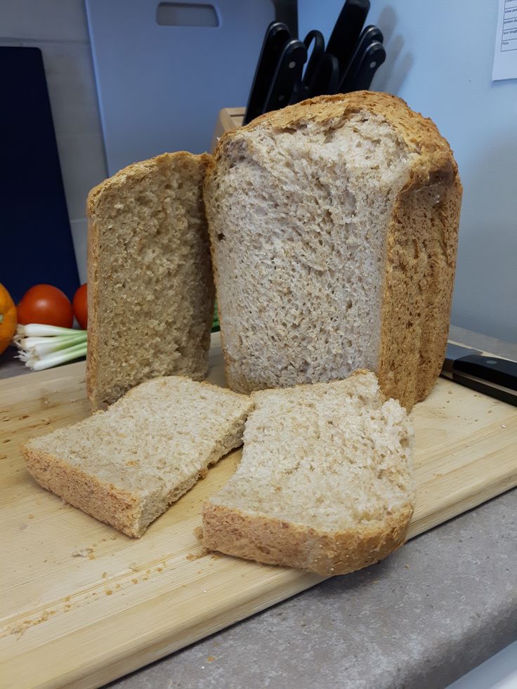 sliced bread sitting on top of a cutting board