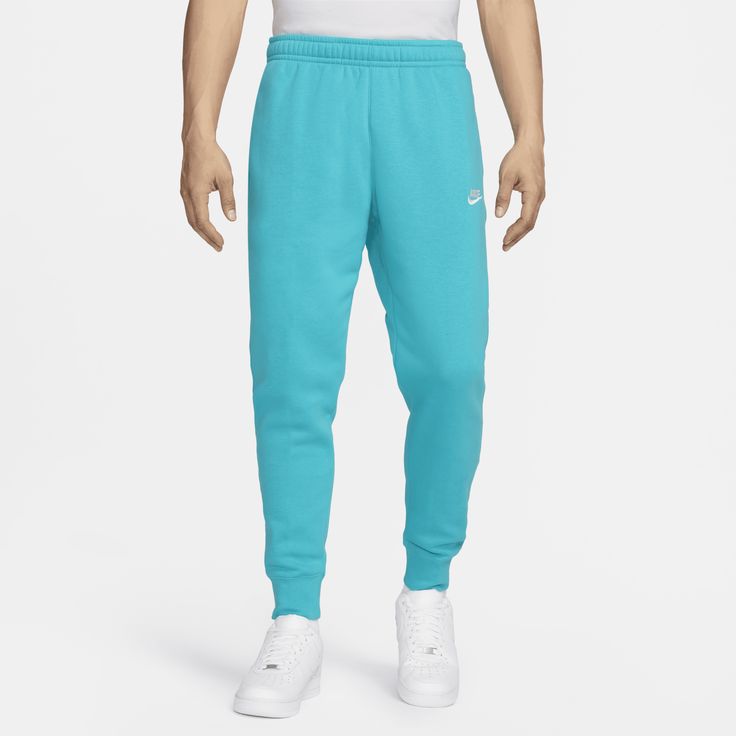 A closet staple, the Nike Sportswear Club Fleece Joggers combine a classic look with the soft comfort of fleece for an elevated, everyday look that you can wear every day. Leisure Sweats With Comfort Waistband, Nike Casual Sweats With Ribbed Cuffs, Casual Nike Sweats With Ribbed Cuffs, Fleece Activewear For Leisure, Casual Fleece Sweats For Sports, Fleece Sweats With Comfort Waistband, Nike Fleece Sweats With Comfort Waistband, Nike Joggers For Leisure, Nike Sportswear Sweatpants With Comfort Waistband