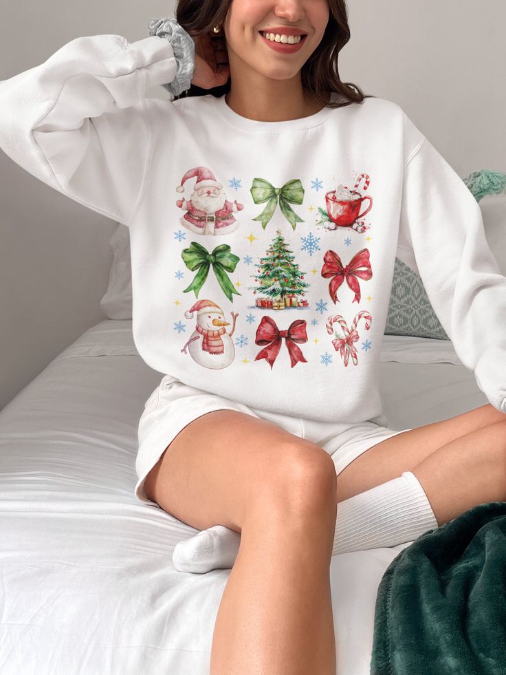 Hey friends! If you're on the hunt for a super cute Christmas sweatshirt that screams festive vibes, then you're in luck! Our Coquette Style holiday top is the perfect Xmas jumper to rock this season. Made for those cozy winter days, this adorable sweater is both stylish and comfy. Imagine yourself in this cute pullover, sipping hot cocoa by the fireplace - total holiday goals, right? Whether you're heading to a holiday party or just snuggling on the couch, this Christmas sweatshirt is a must-ha Cute White Christmas Sweater, White Holiday Sweater As Gift, White Holiday Sweater As A Gift, White Christmas Sweater As A Gift, White Christmas Sweater As Gift, White Winter Sweatshirt For Gift, White Winter Sweatshirt Gift, White Sweatshirt For Winter Gift, White Winter Sweatshirt As A Gift