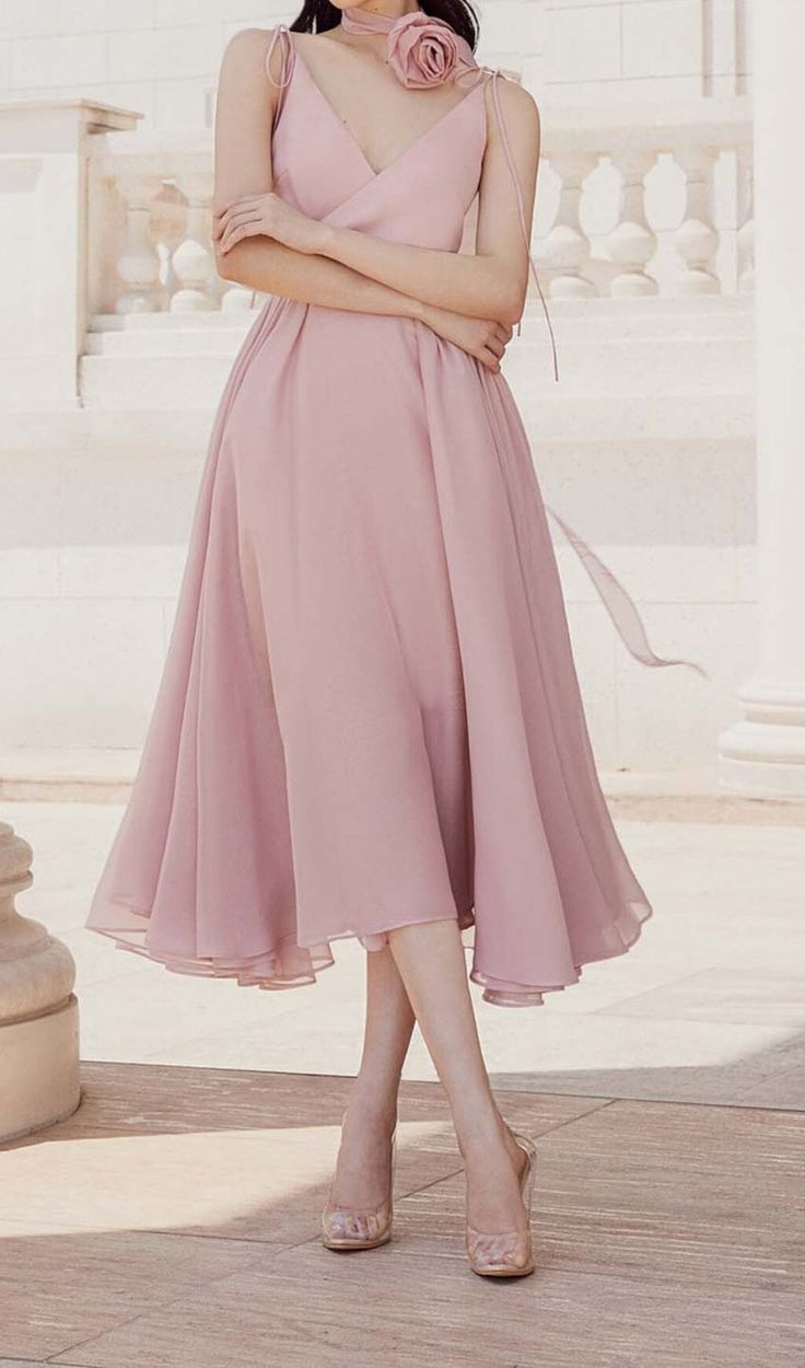 A Gracefully Pleated Pink Midi Dress With a Figure-Flattering Flare Bottom. This Feminine Midi Dress Features Stunning Pleated Details and a Flare Bottom for Added Charm. Gentle Dry Clean Only Colour may vary due to lighting on images. The product images (without model) are closest to the true colour of the product.Item runs true to size chart and is cut to suit our size chart. Please refer to our size chart for the best fit. Do not size up or down. Pink Pleated Chiffon Dress, Pink Flowy A-line Dress, Pink A-line Chiffon Bridesmaid Dress, Pink Flowy Sleeveless Dress, Pink Sleeveless Dress With Flowy Skirt, Pink Bridesmaid Dress With Flowy Skirt, Pink Knee-length Chiffon Dress, Feminine Pink Flowy Midi Dress, Pink Bridesmaid Midi Dress