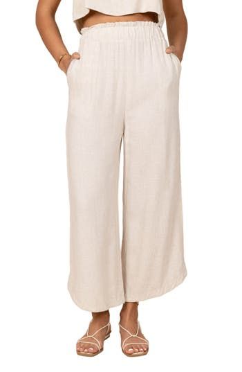 Easy and polished, these elastic-waist pants are crafted from lightweight linen with flowy wide legs. Elastic waist Side pockets Unlined 100% linen Hand wash, dry flat Imported Beach Linen Harem Pants With Pockets, Beach Harem Pants With Pockets In Linen, Spring Linen Wide-leg Bottoms, Neutral Linen Beach Bottoms, Linen Ankle-length Harem Pants For Beach, Linen Wide-leg Pants For Spring, Chic Linen Bottoms With Elastic Waistband, Chic Neutral Linen Bottoms, Ankle-length Linen Harem Pants For Beach