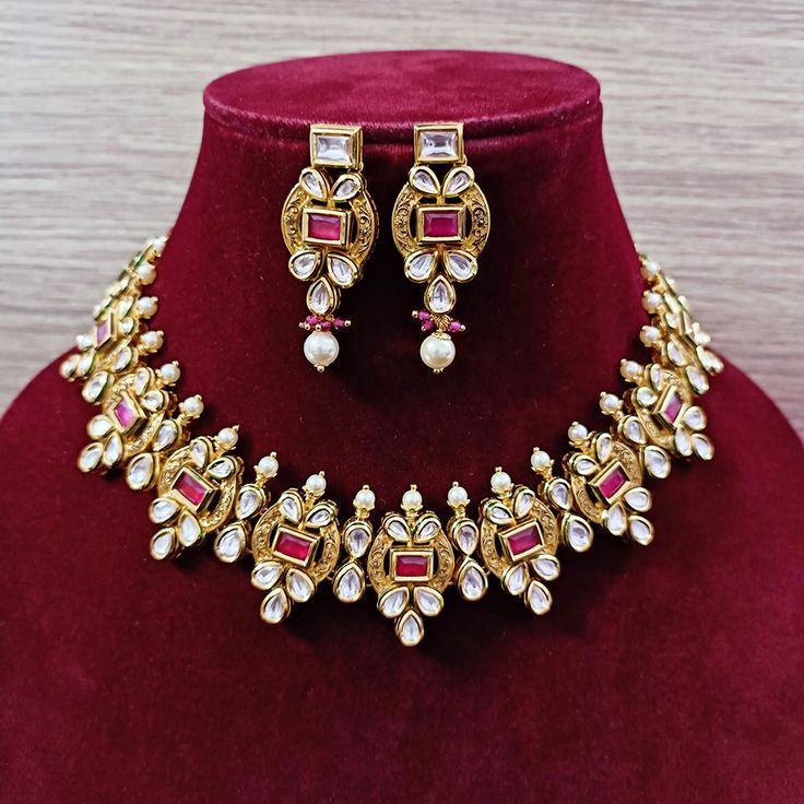 Exotic and snag-free kundan beaded necklace set with earrings. This is a stylish set with White Kundan. This set will work well with traditional, formal, and western formals. Eye-catching and unique jewelry that will set you apart. Gift this piece to a loved one, and see their face light up with joy. Best for gifting or for personal use, wear it to any occasion and become the spotlight. Option 1: White Color (D347) Option 2: Red Color (D348) Kundan Sets For Formal Occasions In Temple Jewelry Style, Temple Style Formal Kundan Necklace, Formal Chandbali Kundan Necklace For Festivals, Festive Kundan Temple Necklace For Formal Occasions, Kundan Jewelry Sets For Diwali And Formal Occasions, Formal Kundan Jewelry Sets For Diwali, Formal Kundan Temple Necklace For Festive Occasions, Formal Festive Jewelry Sets, Formal Kundan Necklace With Cutdana For Festive Occasions