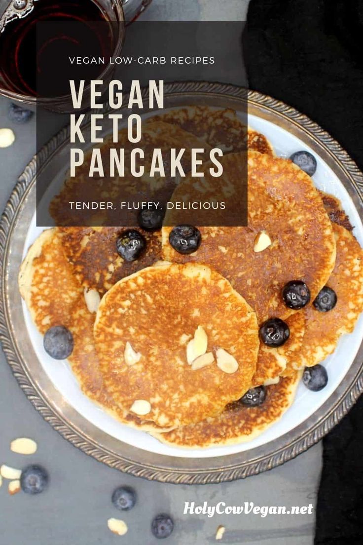 vegan keto pancakes on a plate with blueberries and almonds