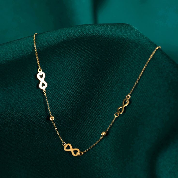 "Introducing our stunning 14k Real Gold Infinity Necklace, a timeless piece that beautifully represents the depth of love and friendship. Crafted with exquisite detail, this necklace features an infinity symbol intertwined with a delicate heart pendant - a perfect embodiment of everlasting affection. Designed for women who appreciate the finer things in life, this heartfelt gold necklace exudes elegance, making it an ideal best friend necklace gift. Made with the highest quality materials, this Formal Infinity Necklace With Adjustable Chain, Gold Infinity Jewelry Gift For Her, Gold Infinity Jewelry As A Gift For Her, Gold Infinity-shaped Jewelry Gift For Her, Elegant Rose Gold Infinity Necklace, Infinity Yellow Gold Jewelry Gift For Her, Infinity-shaped Yellow Gold Jewelry Gift For Her, Infinity Yellow Gold Jewelry As A Gift For Her, Yellow Gold Infinity Jewelry As Gift For Her