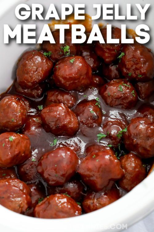 meatballs with grape jelly in a white bowl