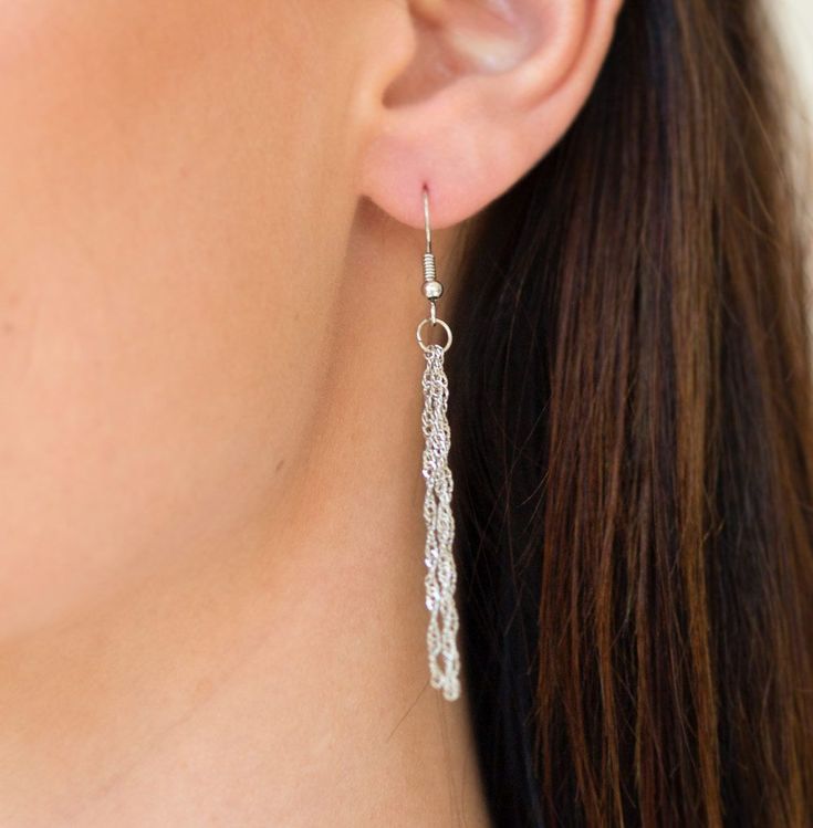 A smooth red stone is chiseled into a teardrop pendant that swings from the bottom of a lengthened silver chain. A wire-wrap fitting is attached to the earthy stone, adding an artisan flair. As the stone elements in this piece are natural, some color variation is normal. Features an adjustable clasp closure.

Sold as one individual necklace. Includes one pair of matching earrings. Gunmetal Ring, Abstract Pendant, Multi Necklace, Purple Gems, Brown Necklace, Purple Necklace, Silver Chains, Floral Pendant, Paparazzi Accessories