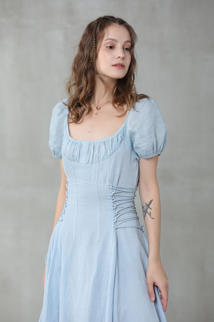 "Linennaive's versatile pieces work for a variety of occasions in effortless shapes and timeless designs. This seafoam-blue girdle dress is cut from a linen and silk-blend and has ruffled neckline and puff sleeve silk sleeves to enhance the breezy, easy-going silhouette. Whether you're going for a casual or classic look, this blue linen midi dress from Linennaive will match perfectly in either way. No doubt. 【Fabric】 Main100% linen, natural pure linen. Medium weight. It is washed with special te Fitted A-line Puff Sleeve Summer Dress, Fitted Midi Vintage Dress For Summer, Casual Maxi Dress With Fitted Bodice And Square Neck, Fitted Vintage Midi Dress For Summer, Fitted A-line Dress With Gathered Neckline, Spring Linen Mini Dress With Square Neck, Spring Square Neck Linen Mini Dress, Fitted Linen Dress For Garden Party, Summer Puff Sleeve Dress With Fitted Bodice