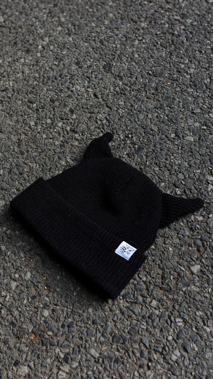 The horniest beanie you'll ever wear. The devil is in the details. Super warm and thick crocheted black beanie. Made with 100% high quality acrylic. Topped off with our signature logo cuff tag sewn in on the fold. Knitted Hats For Streetwear, Adjustable Black Bonnet For Cold Weather, Winter Acrylic Hat For Streetwear, Acrylic Winter Hat For Streetwear, Casual Black Acrylic Beanie, Acrylic Beanie For Streetwear, Black Knitted Hat For Streetwear, Black Bonnet Cap For Fall, Black Fall Bonnet Cap