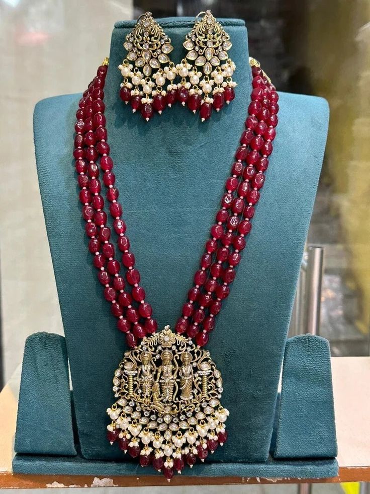 Very Gorgeous and elegant Cz stone Necklace with Matching  Earrings Versatile. Can be  paired with number of outfits. Perfect to wear at weddings occasions. Highest quality and craftsmanship Please let me know if you have any questions Elegant Kundan Jewelry Set For Navratri, Temple Jewelry Tikka With Stone Work For Reception, Festive Jeweled Kundan Jewelry Sets, Kundan Jewelry With Stone Work For Navratri, Festive Temple Jewelry Tikka With Jeweled Details, Kundan Chandbali Jewelry Sets, Elegant Heavy Kundan Necklace For Navratri, Bollywood Style Ruby Jewelry For Festive Occasions, Bollywood Style Festive Ruby Jewelry