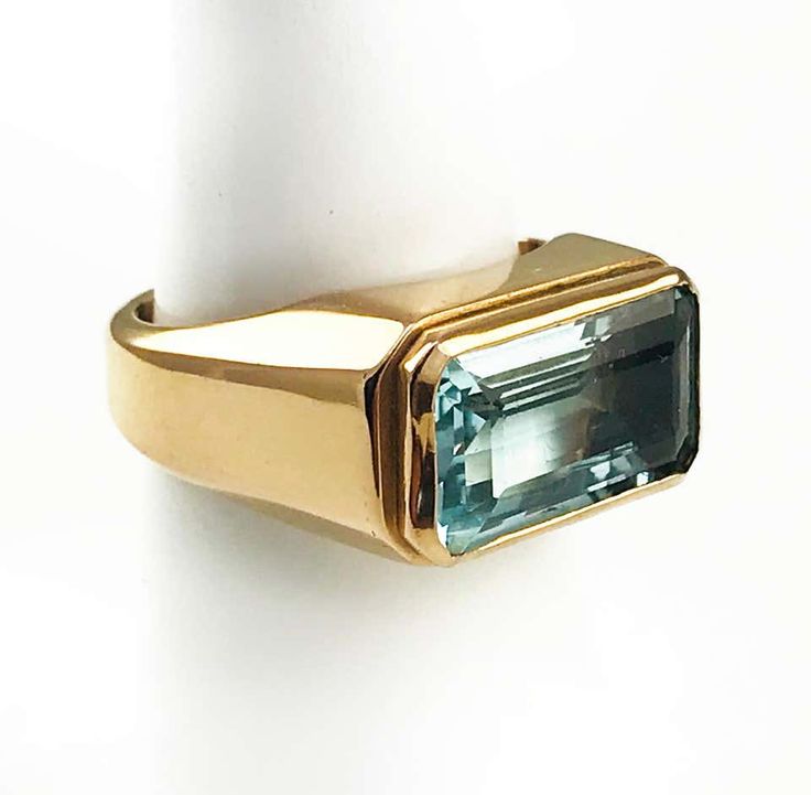 For Sale on 1stDibs - 18 Karat Rose Gold Emerald-Cut Aquamarine ring. The ring design is simple, yet sleek and impactful, the total carat weight of the aquamarine is 7.5ct. Aquamarine Mens Ring, Aquamarine Ring Men, Emerald Ring Design, Gold Aquamarine Ring, Mens Ring Designs, Cool Rings For Men, Antique Gold Jewelry Indian, Mens Gemstone Rings, Mens Rings Fashion