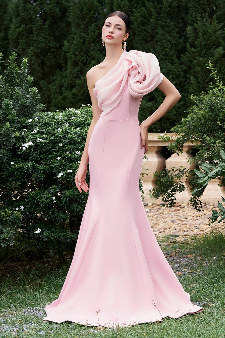 Made of luxurious silk crepe, this dress features a stunning one shoulder design and a figure-hugging mermaid silhouette. Bring elegance and sophistication to any occasion with this timeless and versatile piece. Elegant Pink One Shoulder Dress For Prom Season, Elegant Pink One-shoulder Dress For Prom, Elegant One-shoulder Mermaid Wedding Dress, Elegant Pink Bridesmaid Mermaid Dress, One Shoulder Pre-draped Dress With Sweep Train, Elegant Pink One Shoulder Prom Dress, Elegant Pink One-shoulder Prom Dress, Elegant Off-shoulder Mermaid Dress For Gala, One-shoulder Mermaid Dress With Sweep Train For Gala