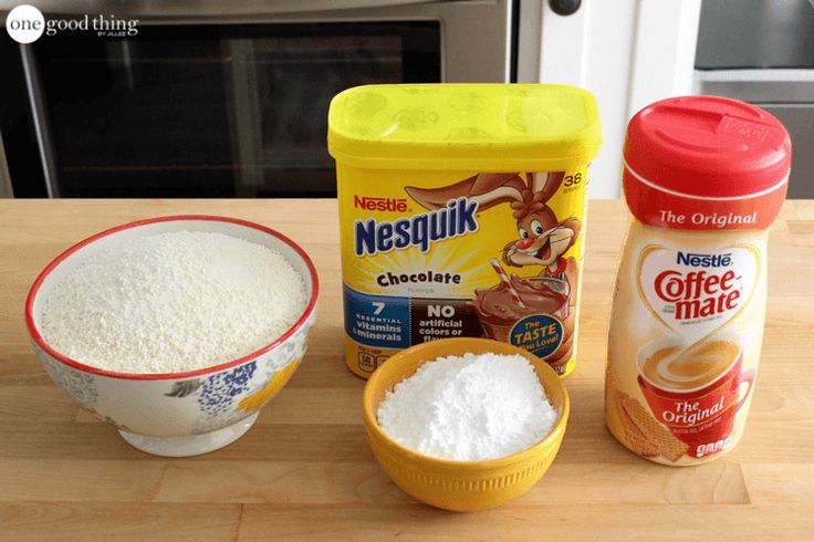 ingredients to make an ice cream dessert sitting on a counter