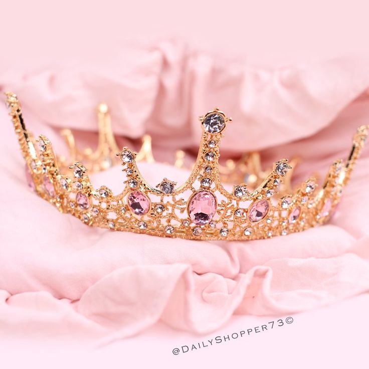 This Is A Brand New Rose Gold Toned Pink Crown. This Beautiful Crown Features Large Pink Glass Rhinestones, Smaller Clear Glass Rhinestones, Ornate Filigree, And Inner Loops For Pinning To The Head For A Secure Fit. High-Quality! Perfect For Special Occasions, Weddings, Bachelorette Party, Princess Costumes, Disney Bounding, Photo Shoots, And More! New To Poshmark? Use The Invite Code Dailyshopper73 When You Create Your Account For $10 Off Your First Purchase! Pink Crown-shaped Wedding Jewelry, Pink Princess Jewelry For Wedding, Elegant Pink Crown-shaped Jewelry, Wedding Dresses Pink Rose Gold, Glamorous Pink Crystal-embellished Jewelry, Pink Crown Aesthetic, Gold Circlet, Ipad Makeover, Feferi Peixes