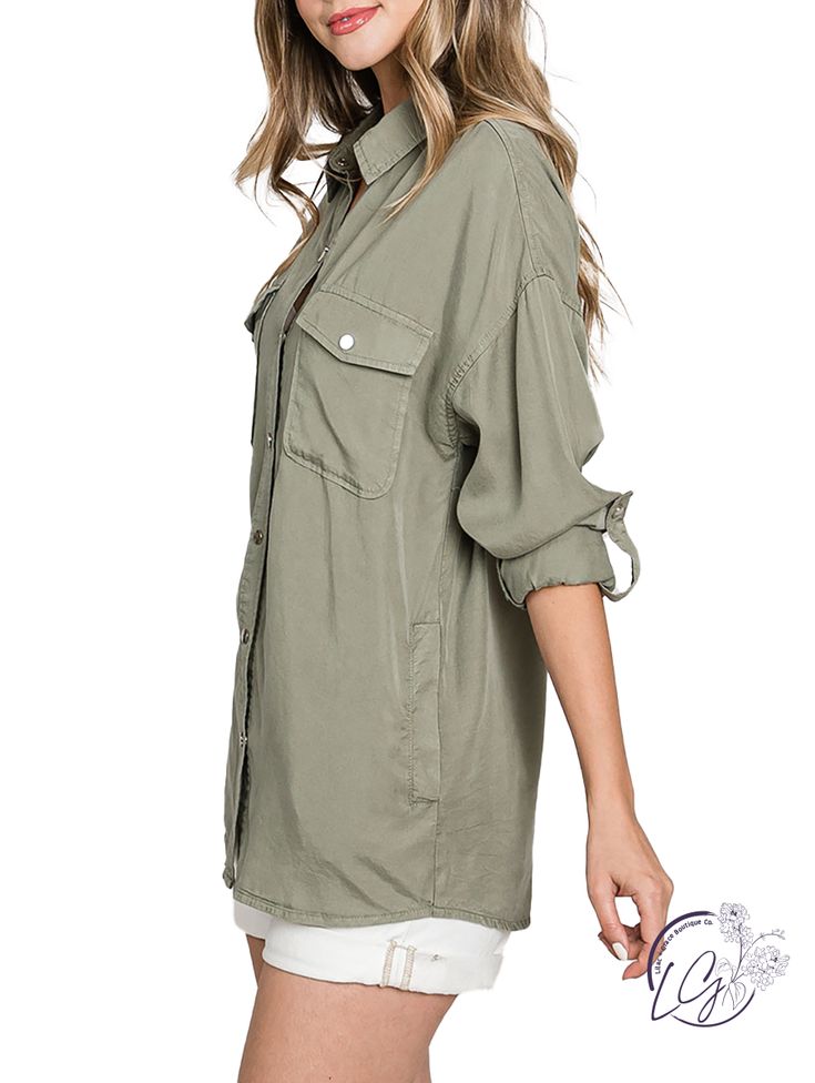 Oversized utility Shirt Made of Soft Washed Tencel. This Shirt has long sleeves with roll-up snaps, chest and side pockets. It's a Light and Oversized Top to Wear Open or Buttoned Up. Fabric: 100% Tencel Oversized Khaki Shacket With Buttoned Pockets, Oversized Cotton Utility Top, Oversized Utility Top With Pockets, Solid Utility Top With Button Closure, Oversized Khaki Button-up Utility Jacket, Oversized Khaki Shacket With Button Closure, Oversized Shirt With Snap Buttons For Fall, Oversized Utility Shacket With Button Closure, Oversized Utility Shacket