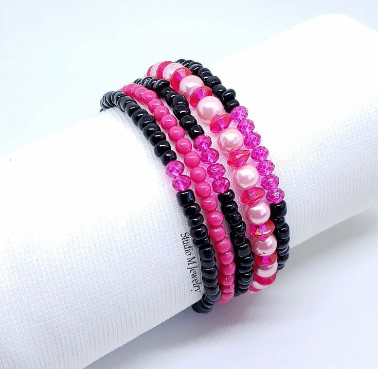 Black And Hot Pink Bracelet Set, Bright Pink Stretch Bracelets, 5 Loose Black Bracelets, Girly Pink Bracelets, Fuchsia Bracelets 4mm black glass with hot pink crystals and resin bead stretch bracelet. Comfortably fits a 7" wrist. You will receive 5 bracelets. #B299 Wanna See More? Click below for other items available: Add On Layering Necklaces: https://www.etsy.com/shop/StudioMJewelry?section_id=42768641 Single Strand Necklaces: https://www.etsy.com/shop/StudioMJewelry?section_id=42768683 Multi-Strand Necklaces: https://www.etsy.com/shop/StudioMJewelry?section_id=42756488 Big & Bold Jewelry: https://www.etsy.com/shop/StudioMJewelry?section_id=42768649 Bracelets: https://www.etsy.com/shop/StudioMJewelry?section_id=42769605 Charm & Bangle Bracelets: https://www.etsy.com/shop/StudioMJewelry? Hot Pink Bracelet, Hot Pink Bracelets, Pink Bracelets, Girly Bracelets, Black And Hot Pink, Layering Necklaces, Bold Jewelry, Bangle Bracelets With Charms, Black Bracelets