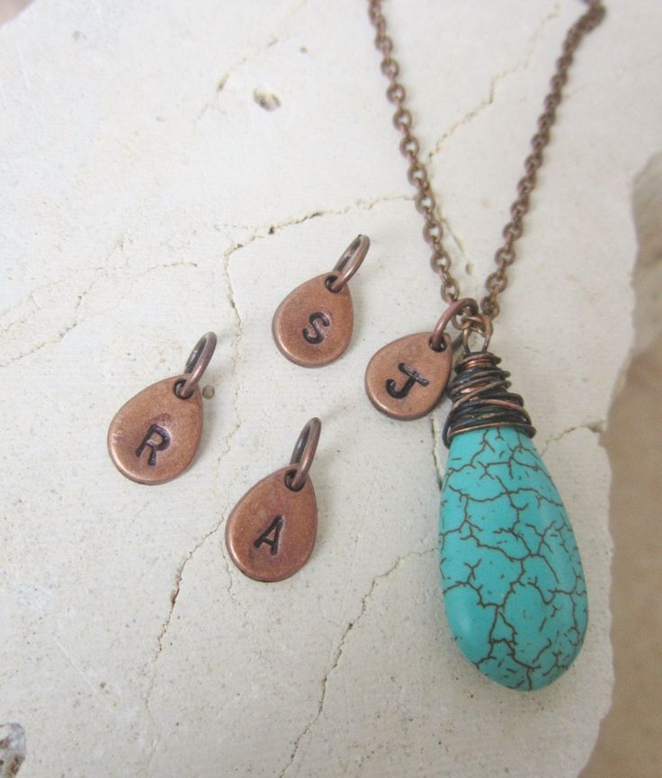 "Add a personalized touch to any piece of jewelry. Choose from any initials A-Z from the drop down box upon checkout. Choose from teardrop shape or heart shape. Choose from copper, gold tone or silver tone from the drop down menu. The teardrop charms measure 1/2\" long in size from the top of the ring and are made from genuine copper. The gold and silver are plated. The heart shaped charms measure 1/2\" long in size from the top of the ring. Thank you for visiting Jen's Bead Box Jewelry" Personalized Teardrop Jewelry As Gift, Personalized Teardrop Jewelry Gift, Personalized Teardrop Pendant For Mother's Day, Personalized Teardrop Jewelry For Mother's Day, Teardrop Copper Jewelry Gift, Teardrop Copper Jewelry For Gifts, Copper Teardrop Jewelry Gift, Copper Teardrop Jewelry For Gift, Personalized Drop Jewelry For Anniversaries