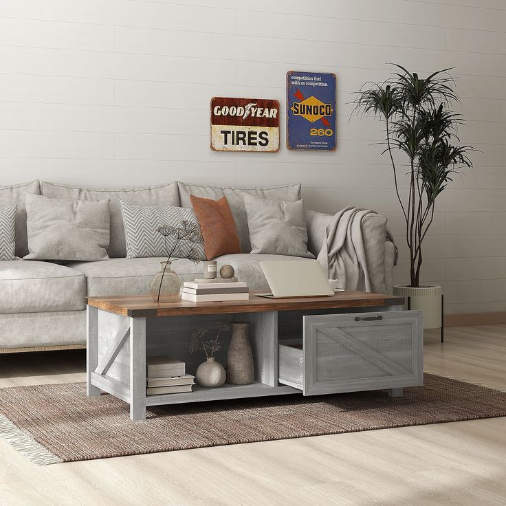 a living room with a couch, coffee table and other items on the rugs