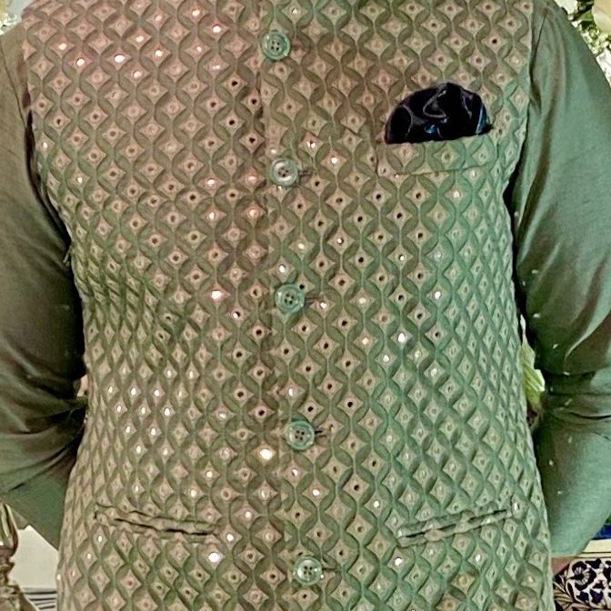 Green bundi embroidered with mirror embroidered motifs and paired with matching kurta and pants. Composition: Georgette, Cotton Silk Care: Dry Clean Only and Vacuum StorageAll products can be customized for colour, sleeves, length of the blouse, and neck design Check Size Guide or choose MySize for free customisationDelivery: 4-6 weeks as the product is hand crafted.For more information and sizes please contact puja@fabilicious.in or visit our Copenhagen studio. Kurta And Pants, Embroidered Motifs, Indian Wedding Wear, Indian Man, Designer Label, Wedding Wear, Contemporary Fashion, Cotton Silk, Polka Dot Top