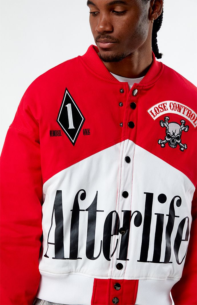 Step into the fast lane with the PacSun Afterlife Race Jacket, designed to elevate your streetwear game. This jacket boasts a sleek and sporty design, perfect for those who appreciate the thrill of speed and style. With its lightweight construction and bold graphics, it's sure to turn heads wherever you go.


	Ribbed collar
	Long sleeves
	Button closures
	Ribbed cuffs & hem
	Left chest patch
	Large front graphic
	Quilted lining
	Body: 97% cotton, 3% spandex
	Machine washable
	Model is wearing size medium
	Model Measurements: 6'1” Height, 31” Waist, 32” Inseam Slim Fit Cargo Pants, Sporty Design, Dad Jeans, Curve Jeans, Jeans Kids, Kids Swimwear, Bold Graphics, Slim Fit Pants, Man Swimming