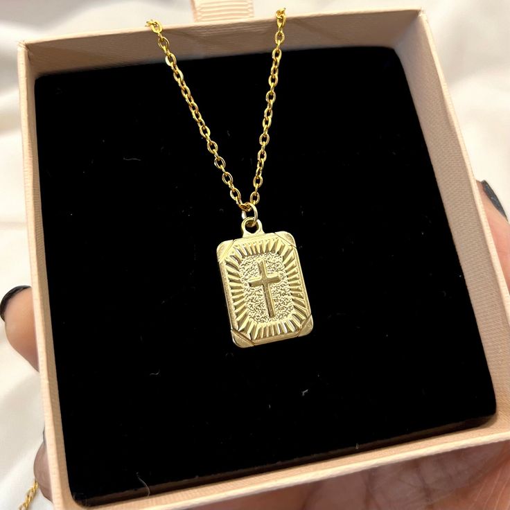 This necklace features a square cross necklace Chain Size - 2mm  Charm: 25 x 17mm This Jewellery comes in a pouch ready for gifting. Upgrade to box here: https://www.etsy.com/uk/listing/1534147075/add-a-gift-box-to-your-order Please contact us if you require any more information. Images in this gallery may appear bigger than they actually are due to different monitor sizes. Please read descriptions properly for sizes and dimensions. We are a dainty silver jewellery shop. Square Cross Necklace, R Square Gold Pendant, Square Pendant Necklace, Necklace Cross, Square Necklace, Dope Jewelry, Jewellery Shop, Medallion Necklace, Square Pendant, Gold Pendant Necklace