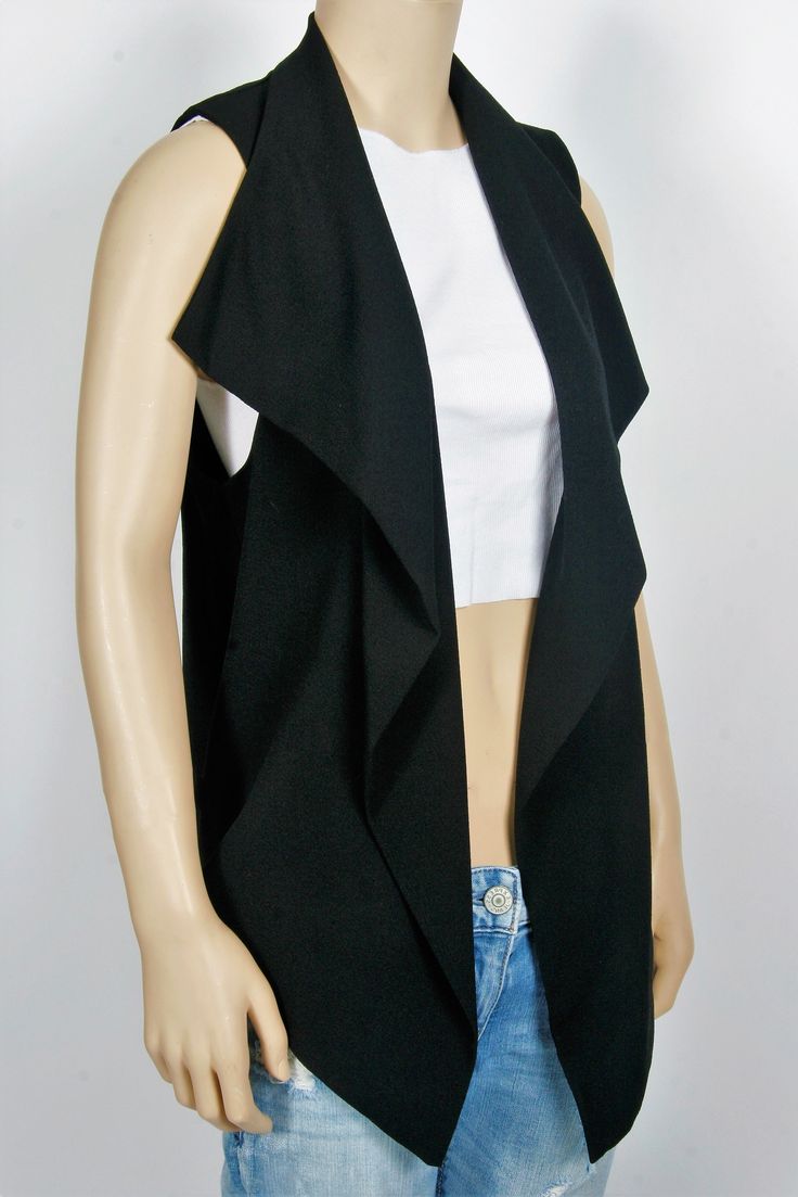 New With Tags Size: Small Color: Black Waterfall Style Vest Open Front 97% Polyester, 4% Spandex Please Note: Listing is for the vest only. The shirt worn under the vest is not included and is shown for styling purposes only. Fitted Tank Top For Layering In Fall, Fitted Versatile Vest For Layering, Fitted Black Tank Top For Fall, Trendy Fitted Sweater Vest For Fall, Vest Tops For Layering In Fall, Sleeveless Black Outerwear For Summer, Black Sleeveless Outerwear For Summer, Black Sleeveless Summer Outerwear, Black Sweater Vest For Summer Layering