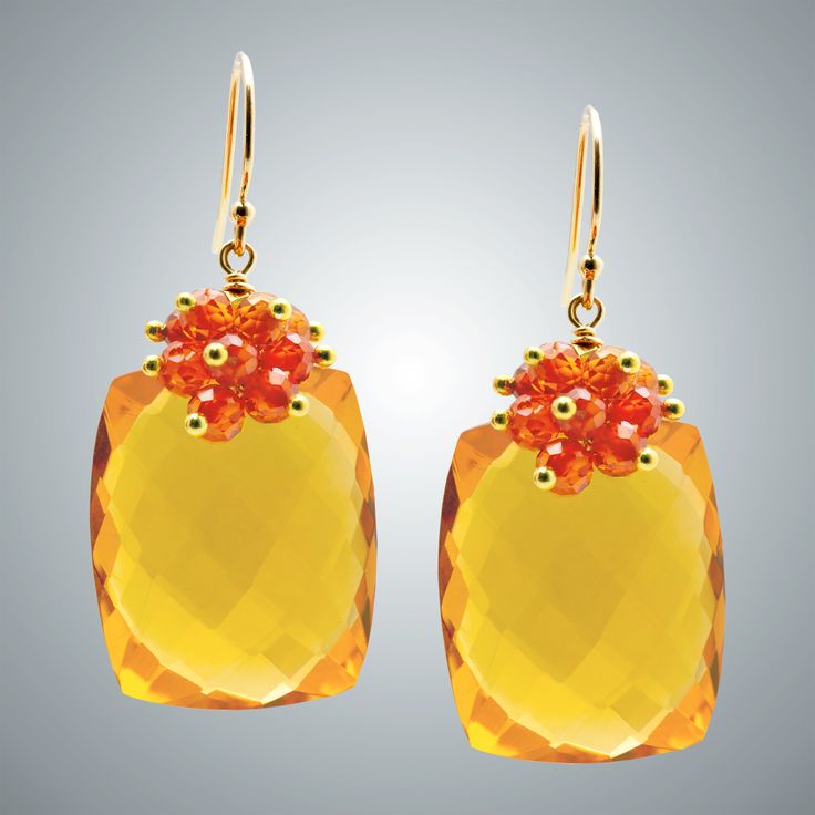 Gold & Stone Earrings - The vivid contrast of gold quartz drops, faceted carnelian, and 24k gold vermeil makes these earrings a delight to behold. 14k gold-filled ear wires. Carnelian Gold Earrings With Ear Wire, Gold Carnelian Earrings With Ear Wire, Gold Carnelian Gemstone Earrings, Orange Gemstone Drop Earrings, Orange Carnelian Gemstone Earrings, Orange Citrine Gemstone Earrings, Elegant Faceted Citrine Earrings, Yellow Citrine Faceted Earrings, Cluster Earrings